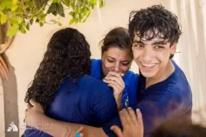 Coptic children and volunteers celebrating after field games