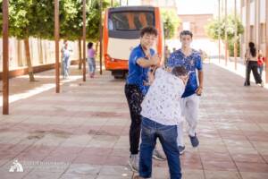 Volunteers and children playing water balloon games in Egypt