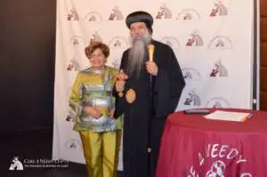 His Grace Bishop David, Bishop of the Coptic Orthodox Diocese of New York and New England with Laila Sidhom the founder and President of the Board of Directors for Care 4 Needy Copts